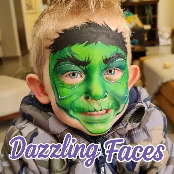 Hulk face paint on a boy